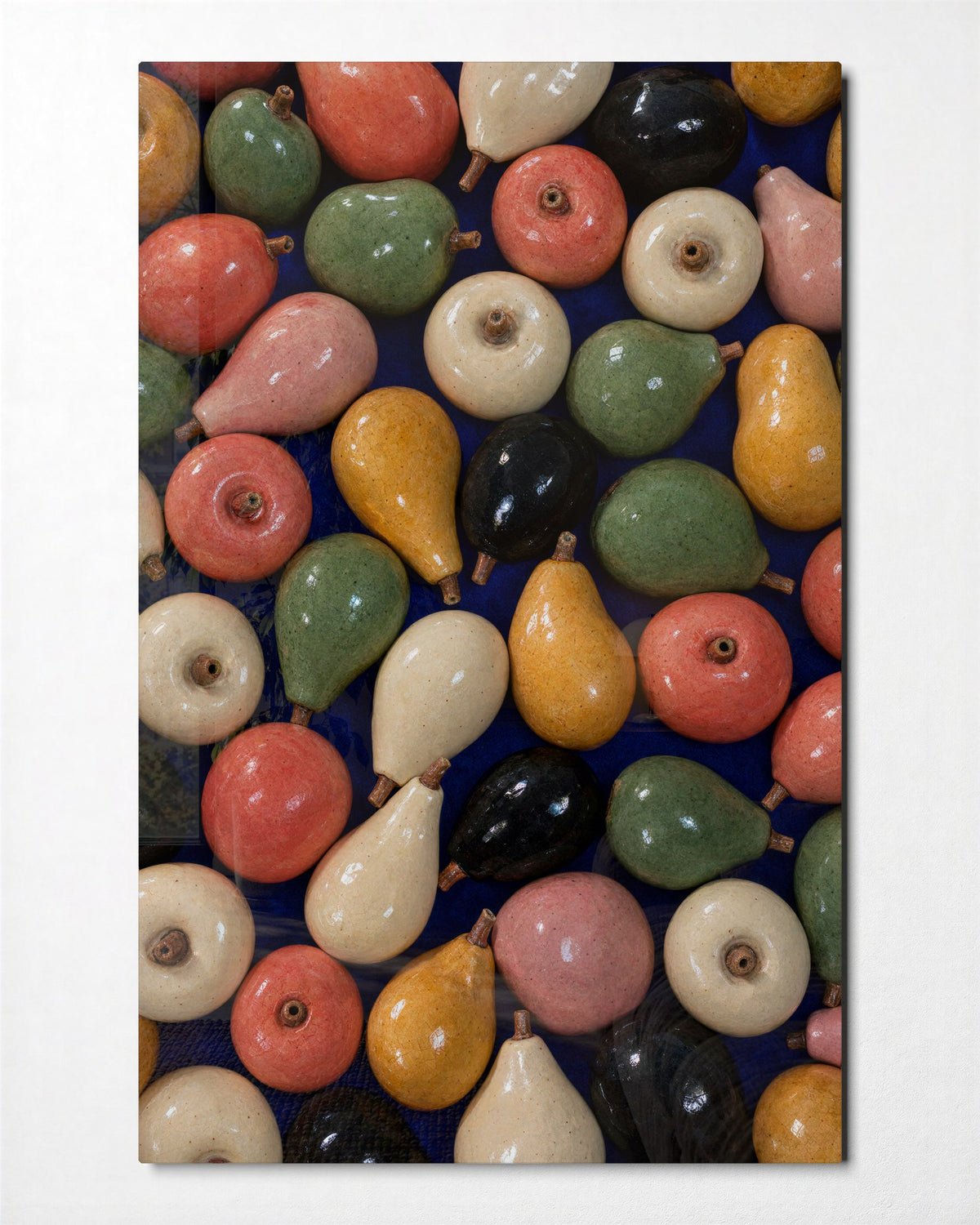 Glazed Orchard Pile glass wall art, front view
