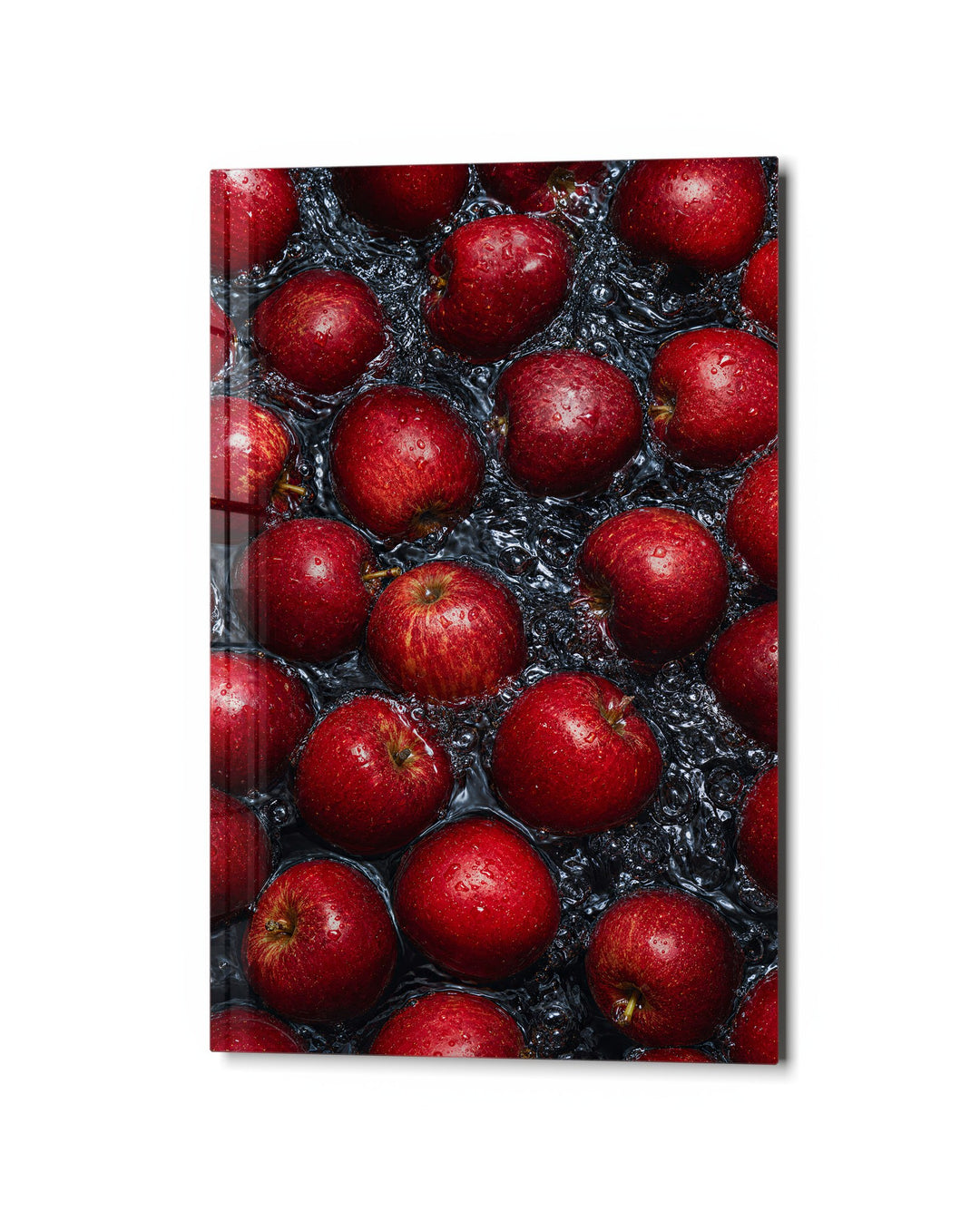 Red Apple Pile glass wall art, studio view