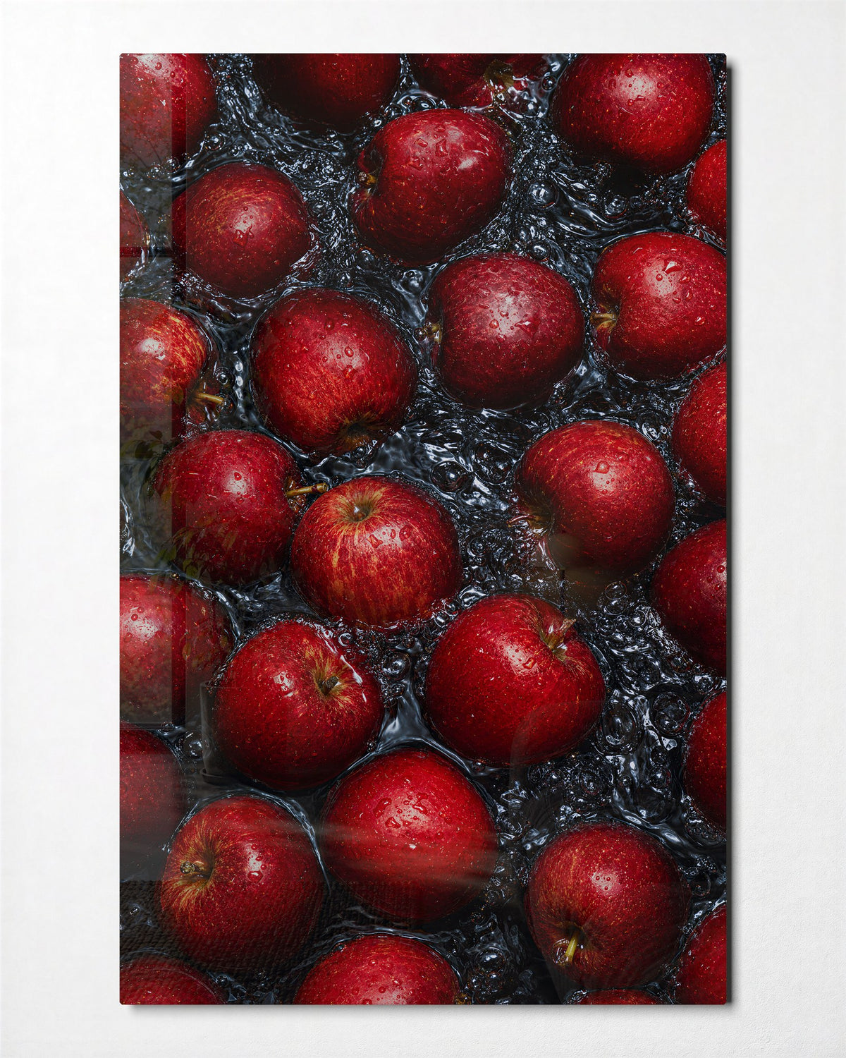 Red Apple Pile glass wall art, front view