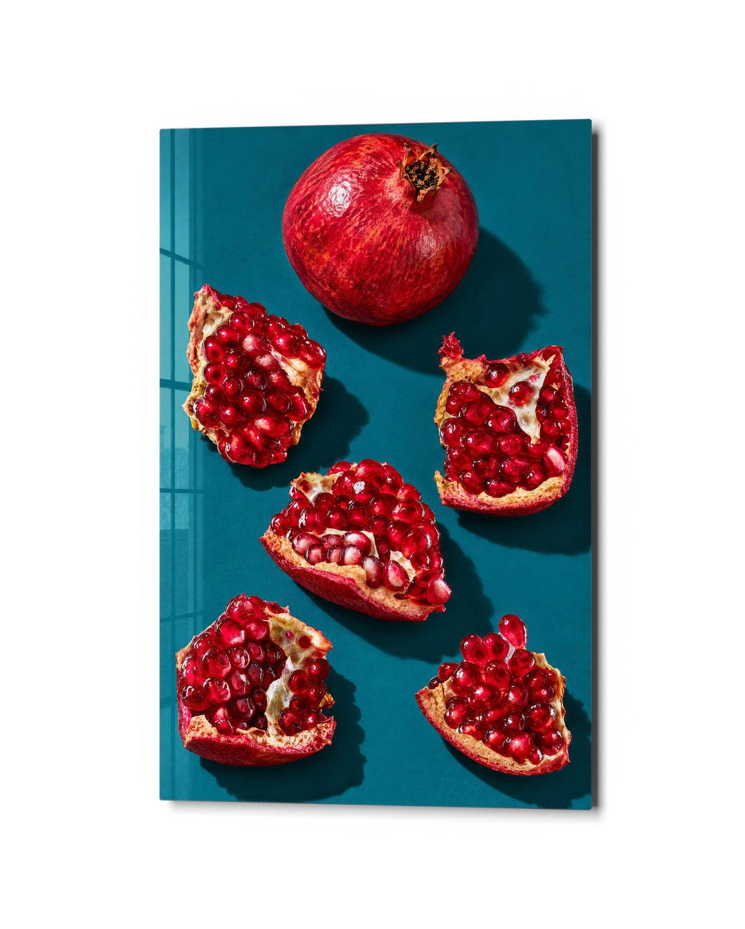 Teal Table, Red Seeds glass wall art, studio view