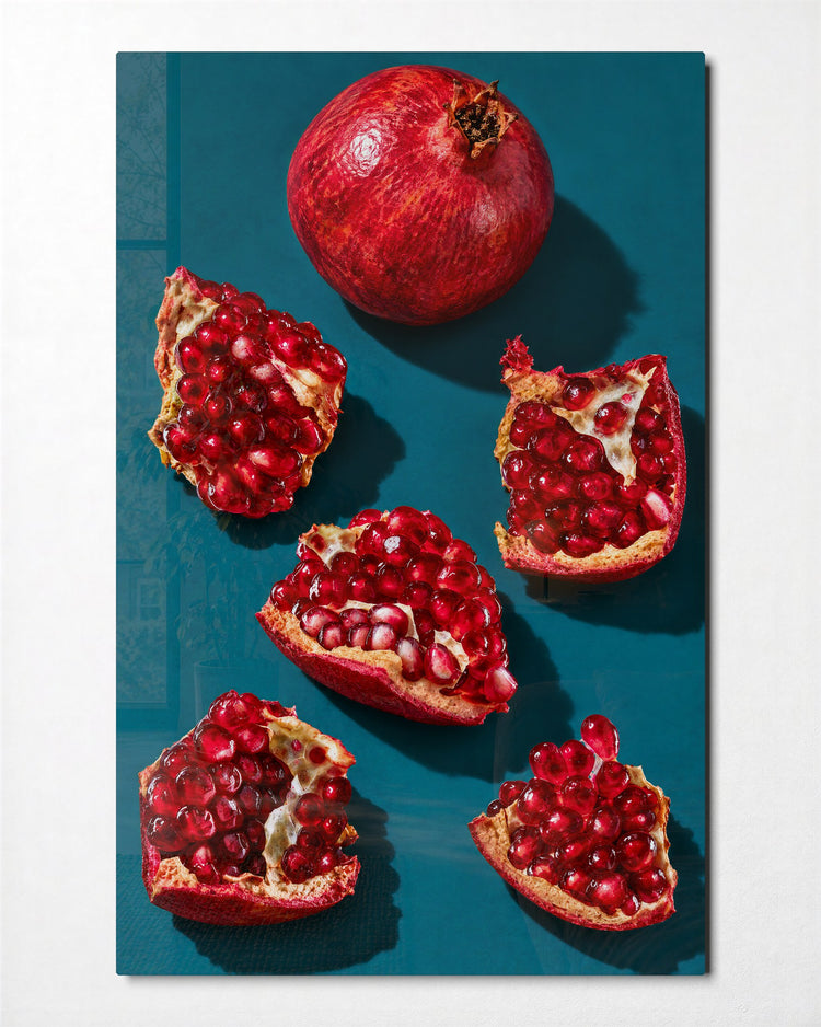 Teal Table, Red Seeds glass wall art, front view