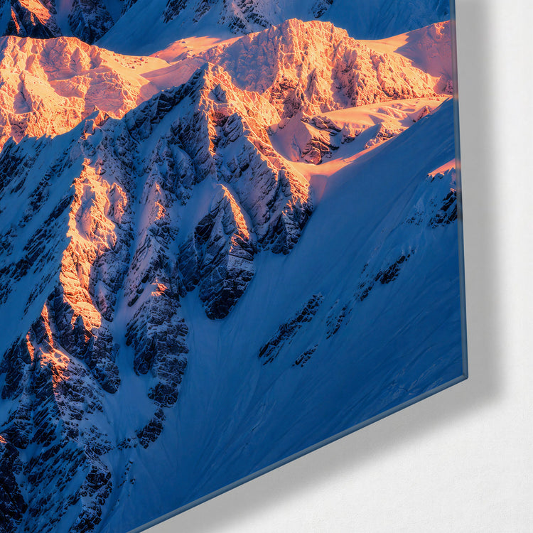 Peaks Pay No Favors glass wall art, corner view
