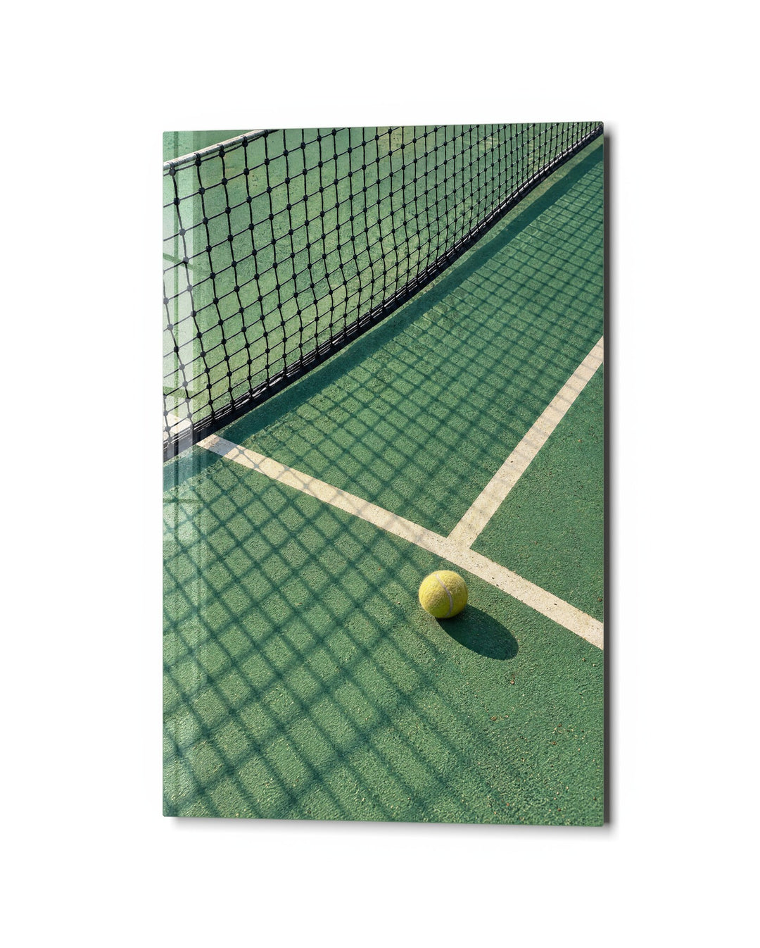 Tennis Ball Takes Five glass wall art, studio view