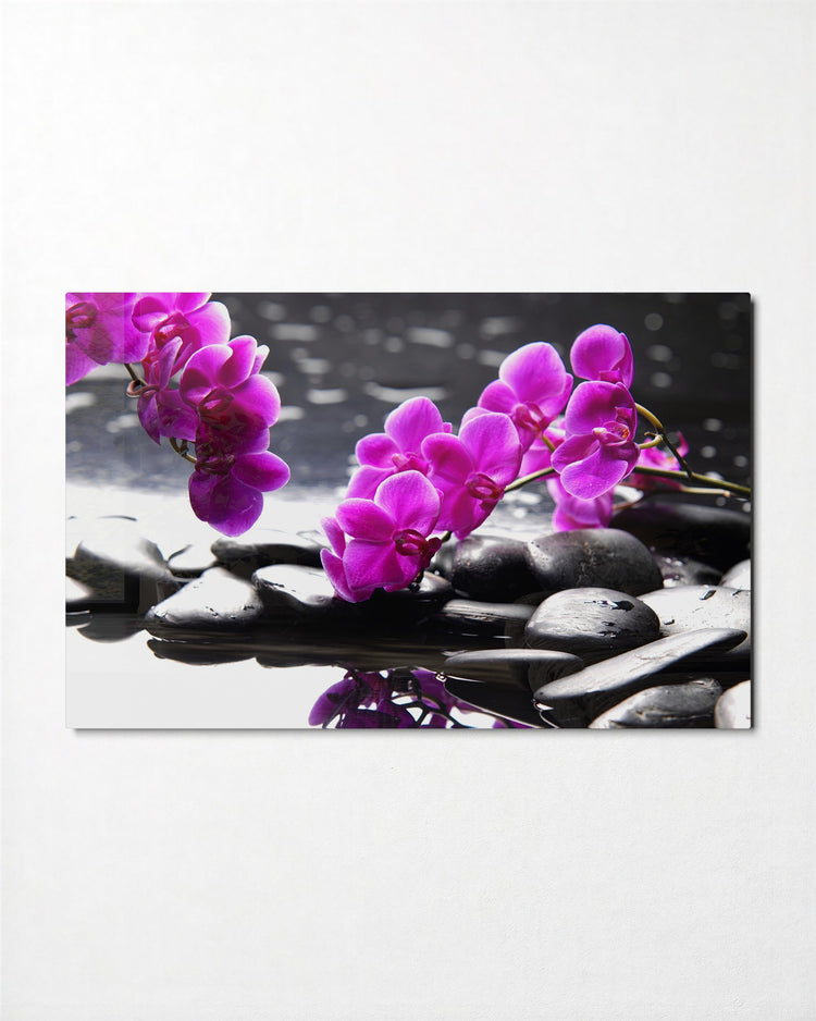 Orchids on Black Stones glass wall art, front view