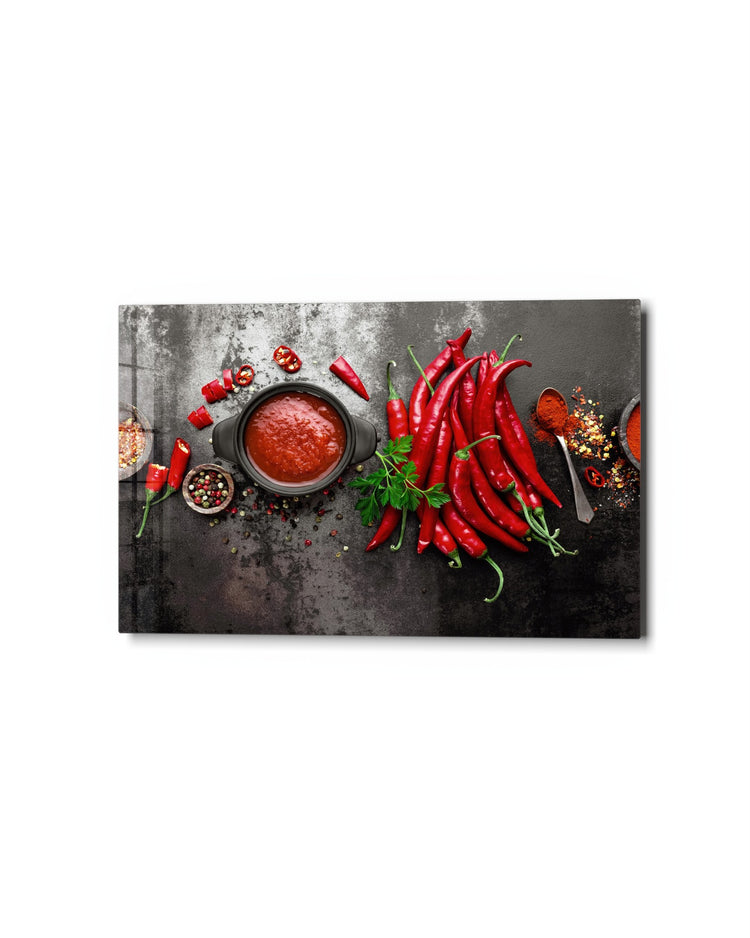 Chili Peppers and Red Sauce glass wall art, studio view