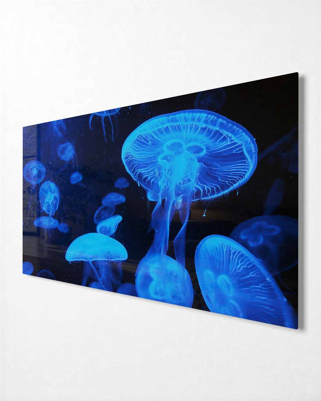Blue Jellyfish Glow glass wall art, side view