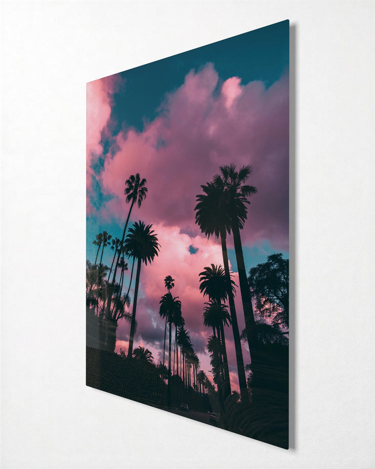 Palms Under Pink Clouds glass wall art, side view
