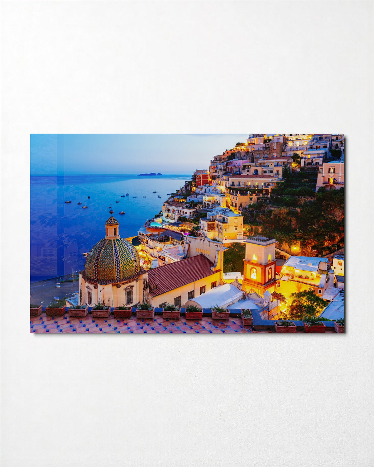 Cliffside Town at Dusk glass wall art, front view