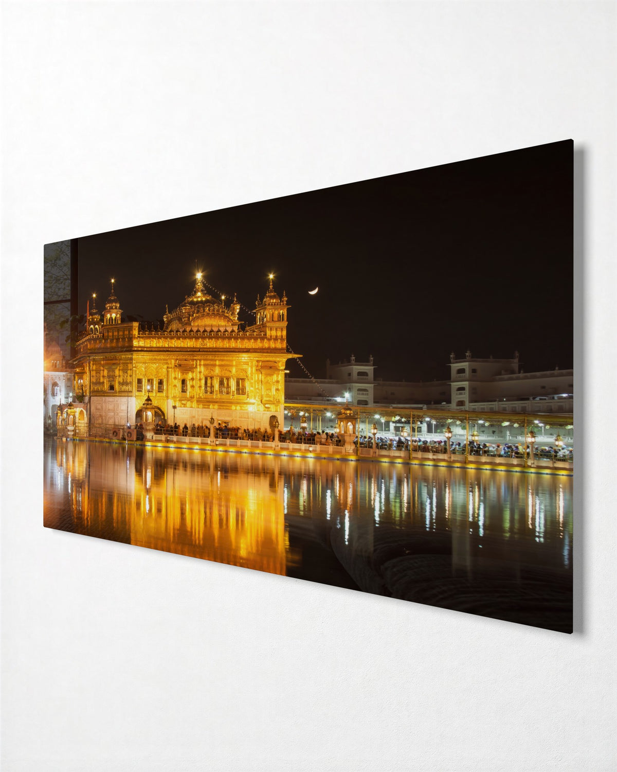 Golden Temple at Night glass wall art, side view