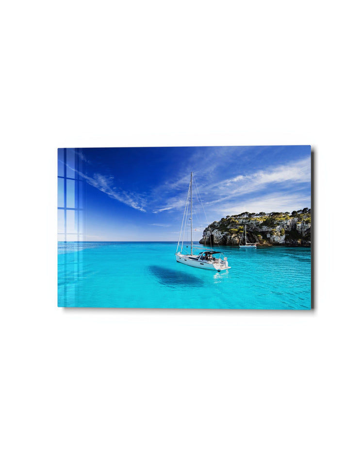 Sailboat by the Cliffs glass wall art, studio view